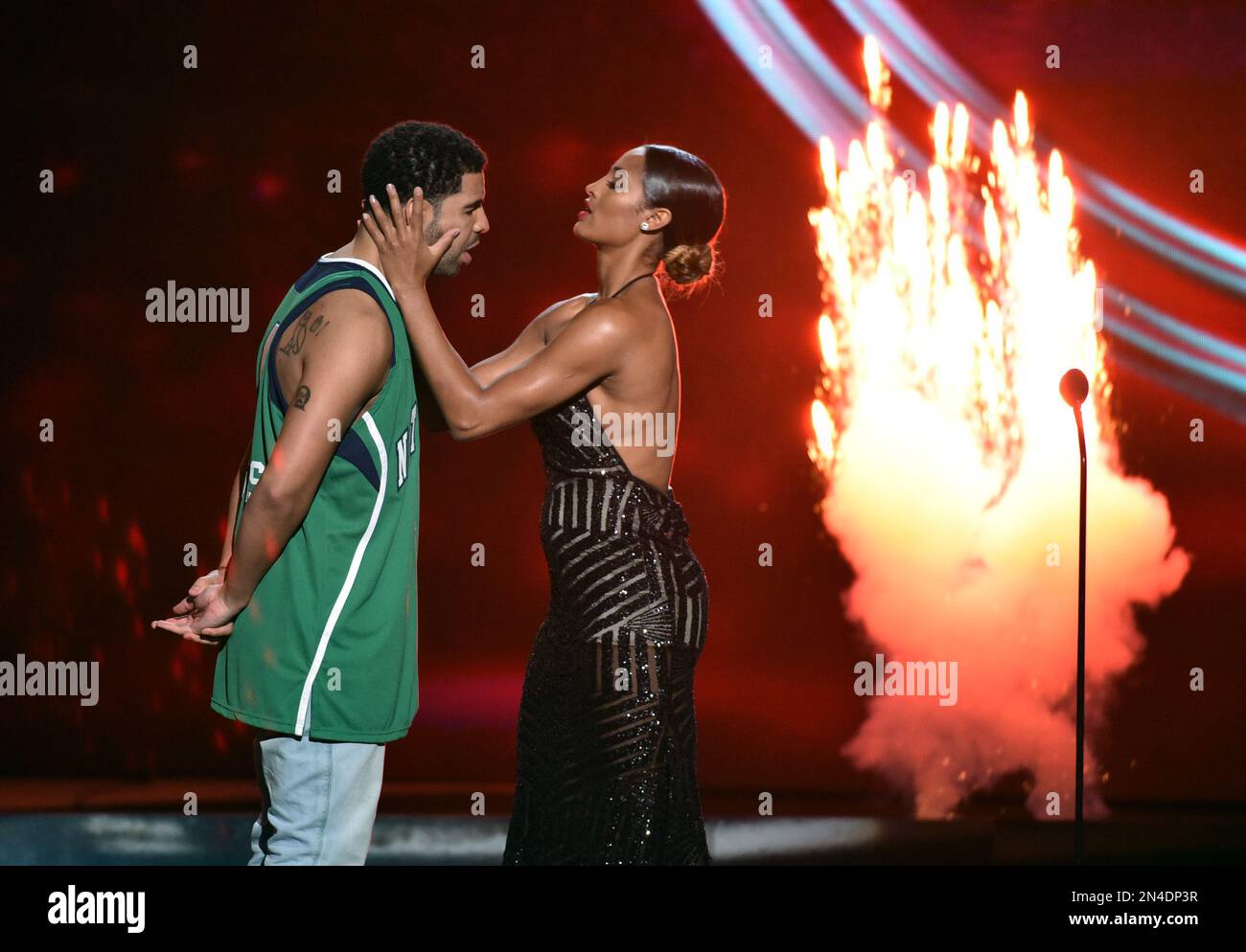 Skylar Diggins and Drake, left, stand on stage at the ESPY Awards at ...