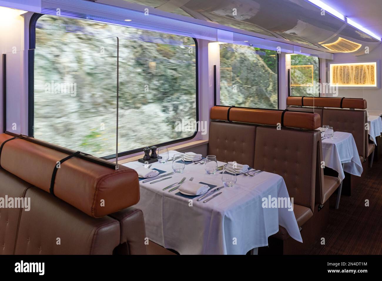 Interior of the gold leaf Rocky Mountaineer dining car train wagon while riding in British Columbia, Canada. Stock Photo