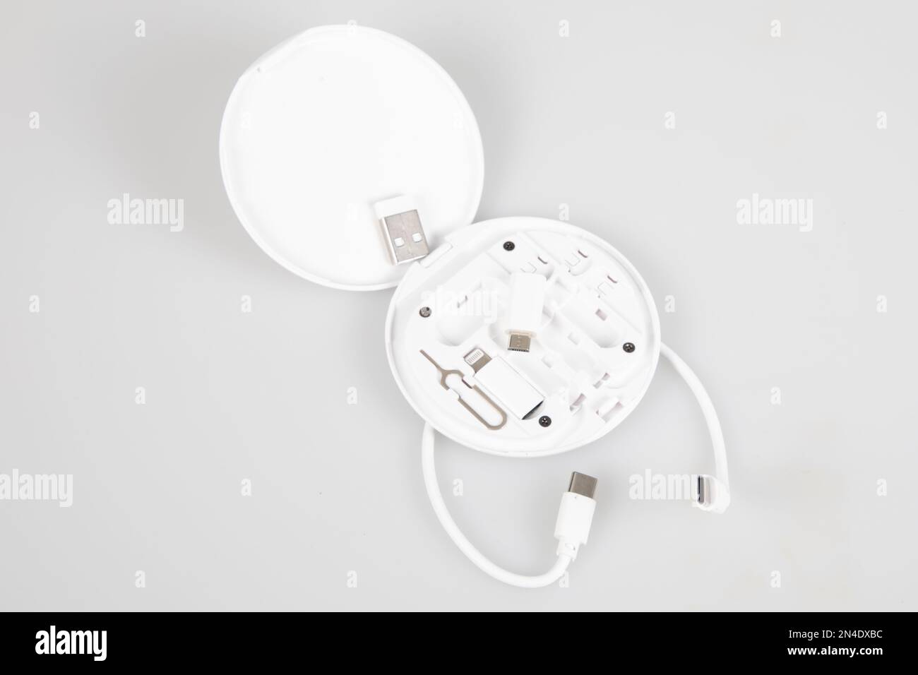 set box of white types connectors cable for charging a mobile phone on