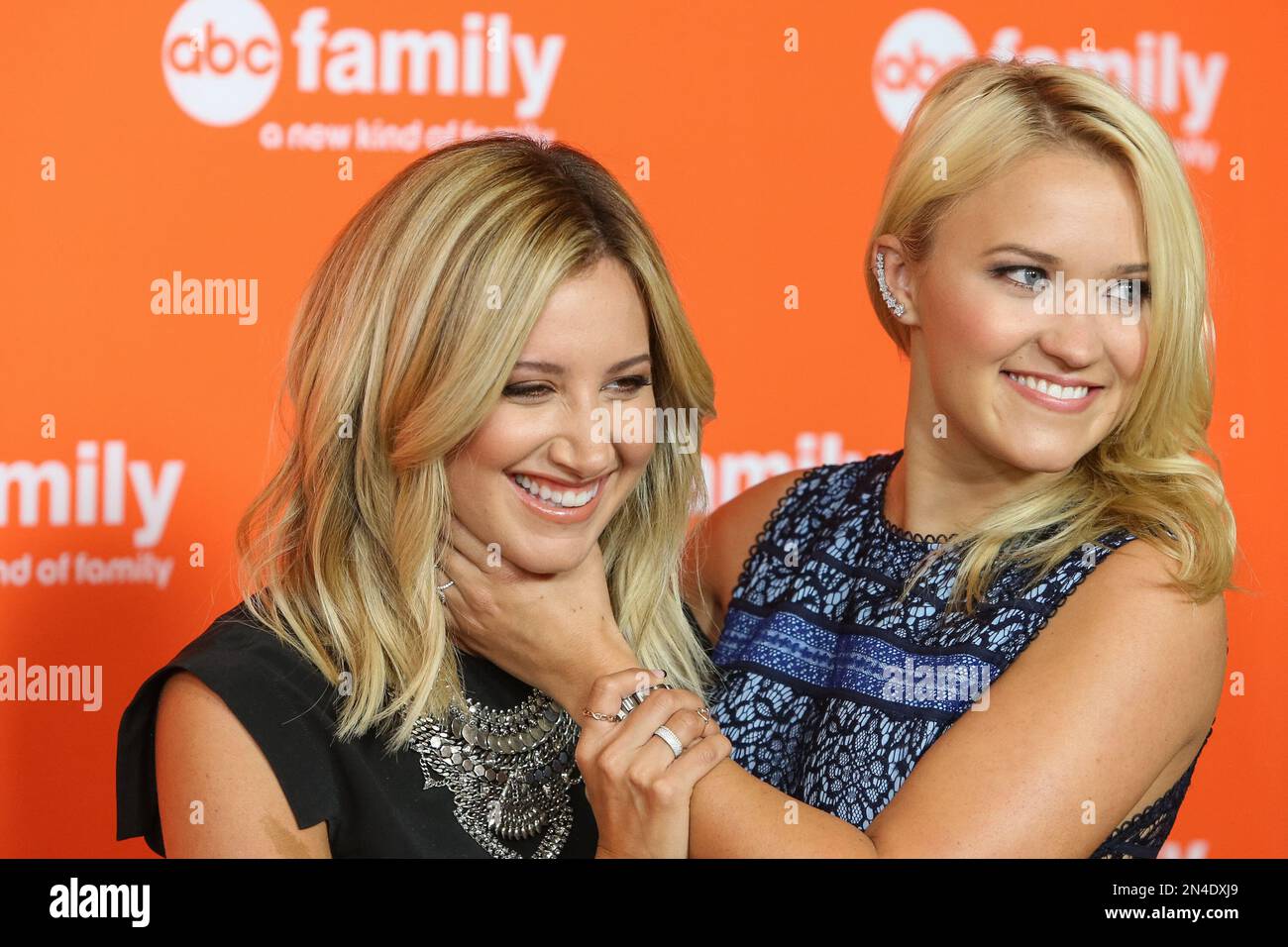 Ashley Tisdale, left, and Emily Osment attend the Disney/ABC Television Group 2014 Summer TCA