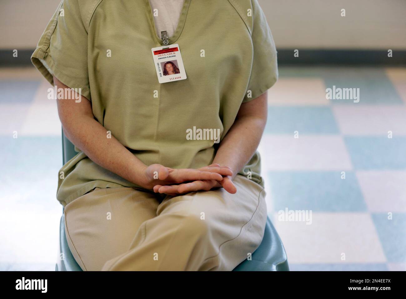 In this photo made Monday, July 22, 2013, Amanda Busse talks to a