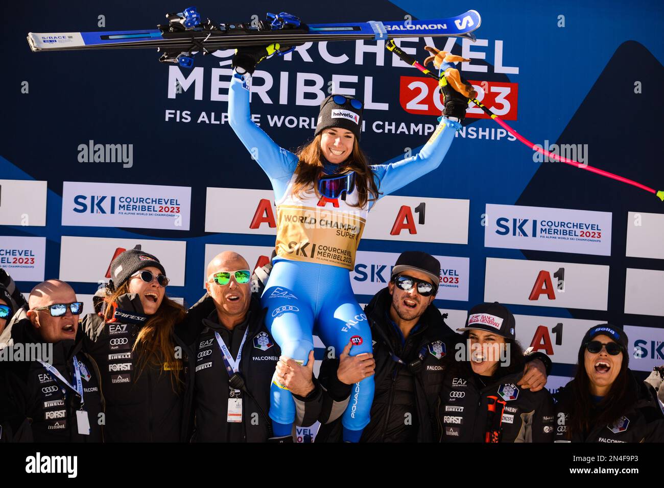 Meribel, France. 8th Feb, 2023. MARTA BASSINO of Italy and members of the Italian Ski Team celebrate after she won the Women's Super-G ski race in Meribel France. (Credit Image: © Christopher Levy/ZUMA Press Wire) EDITORIAL USAGE ONLY! Not for Commercial USAGE! Stock Photo