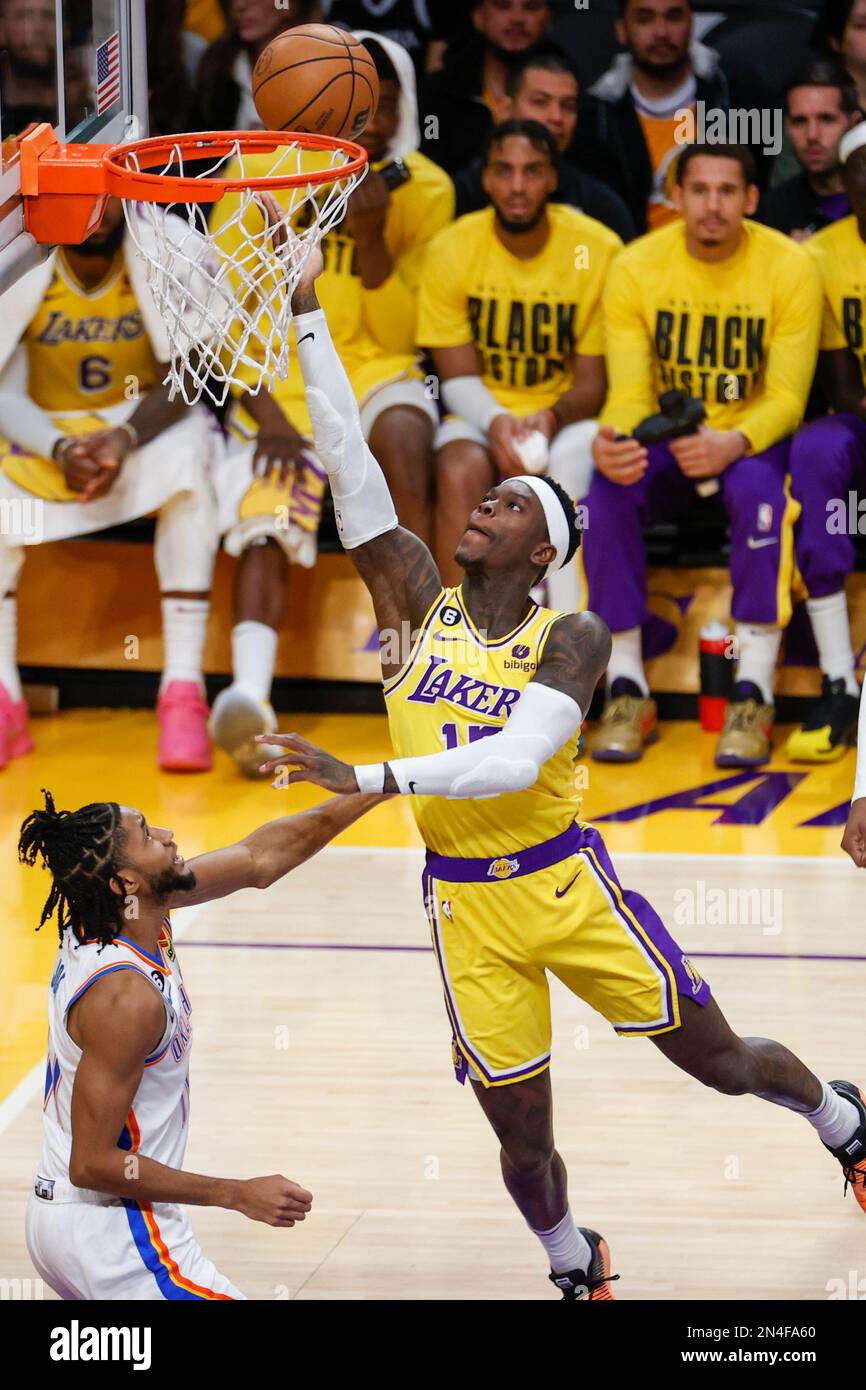 Los Angeles Lakers guard Dennis Schroder (R) goes to basket against  Oklahoma City Thunder guard Isaiah Joe (11) during an NBA basketball  game.Final scores; Thunder 133:130 Lakers (Photo by Ringo Chiu /