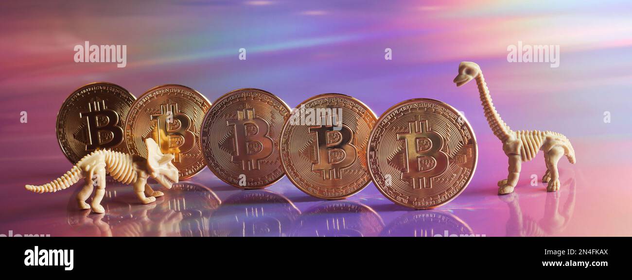 Golden bitcoin coins with dinosaurs on neon background. digital currency, business style. Mining and trade bitcoin, evolution concept. banner Stock Photo