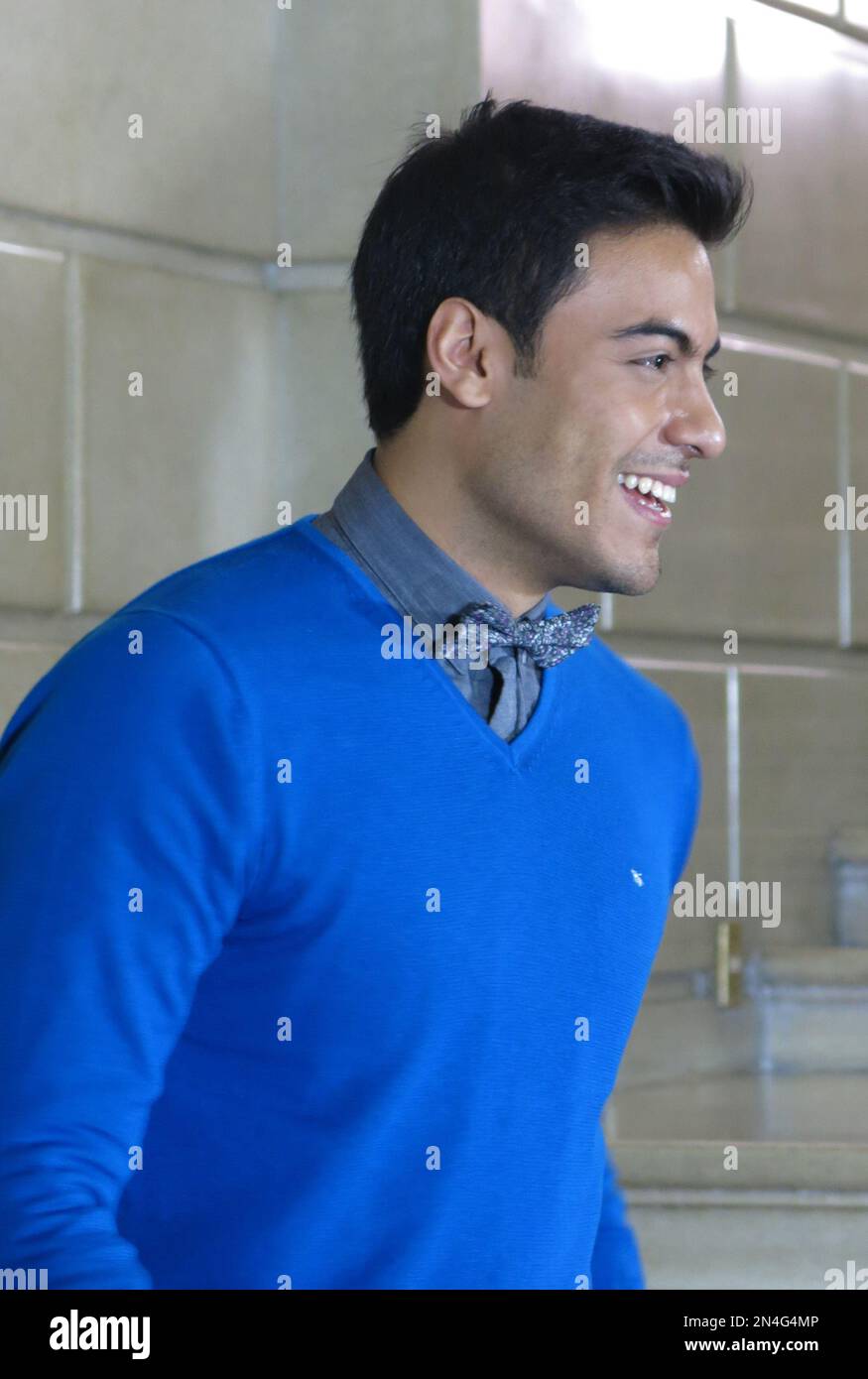 Mexican singer Carlos Rivera poses for pictures after a press conference to  promote his upcoming concerts celebrating 10 years of his career, in Mexico  City on Monday June 30, 2014. Rivera will