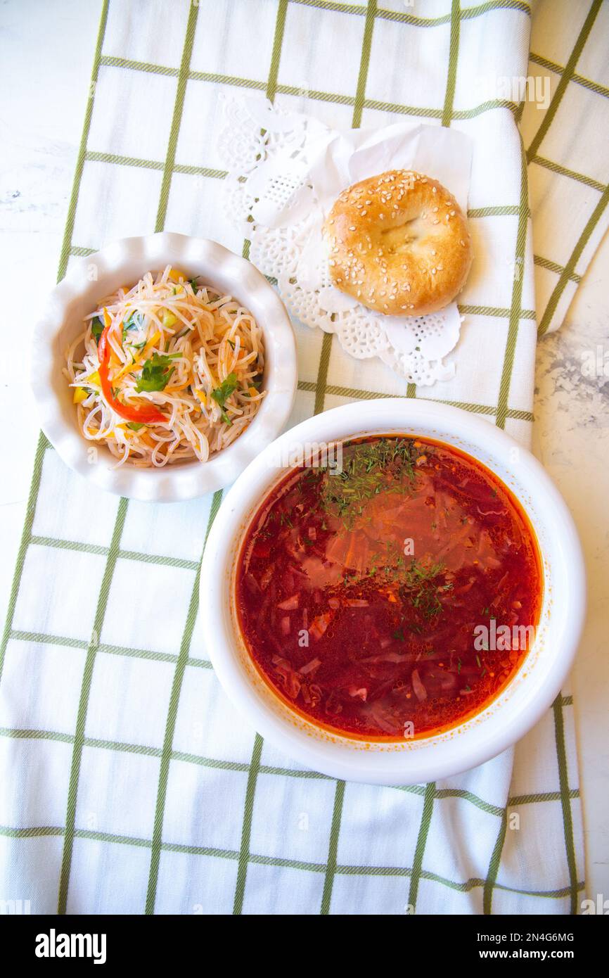 top view of borscht, salad and bread cake on the table Stock Photo