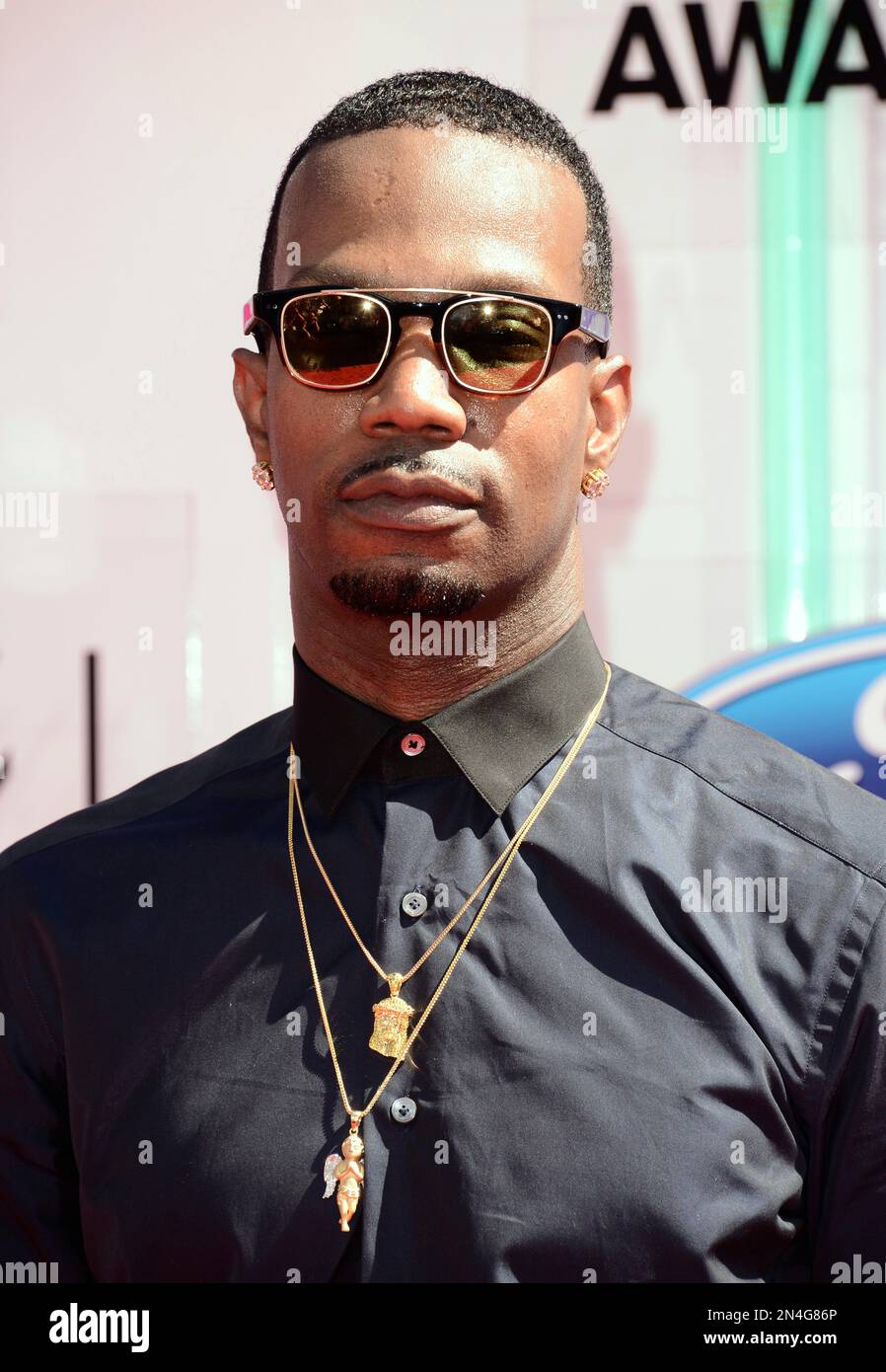 Juicy J arrives at the BET Awards at the Nokia Theatre on Sunday, June