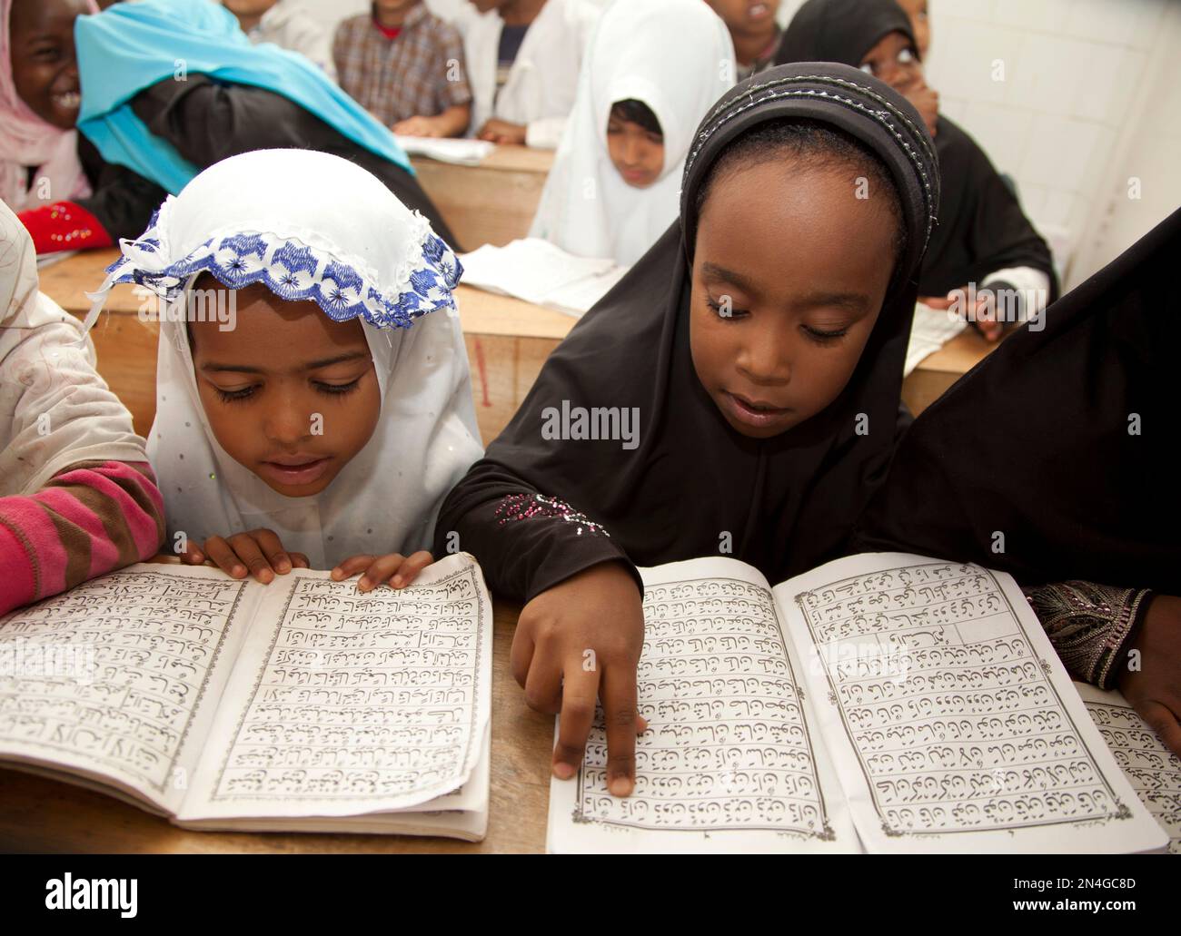 Children recite the Quran at the start of Muslim holy month of Ramadan