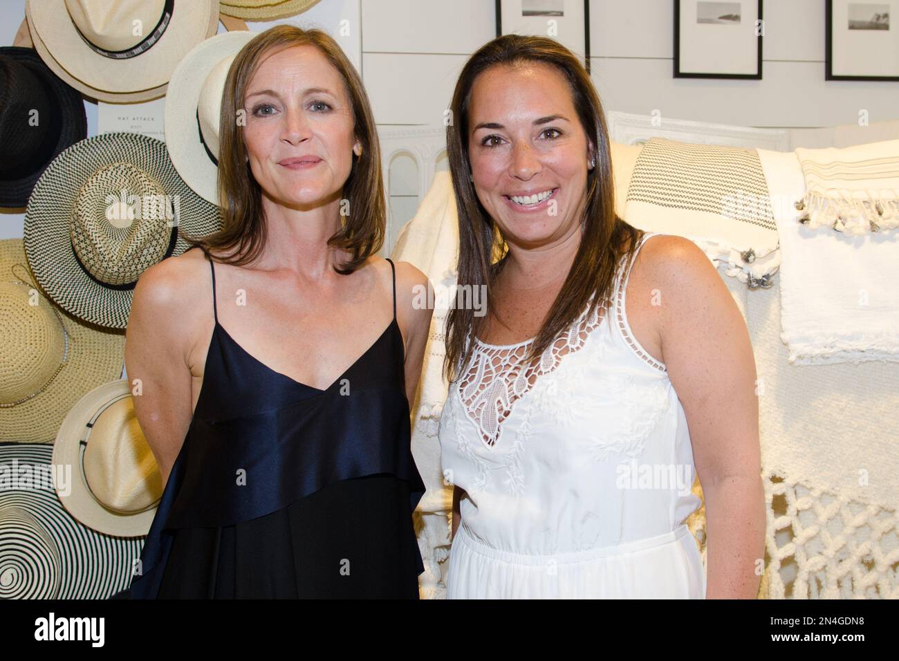 Caroline Belhumeur and Samantha Yanks attend a Club Monaco store