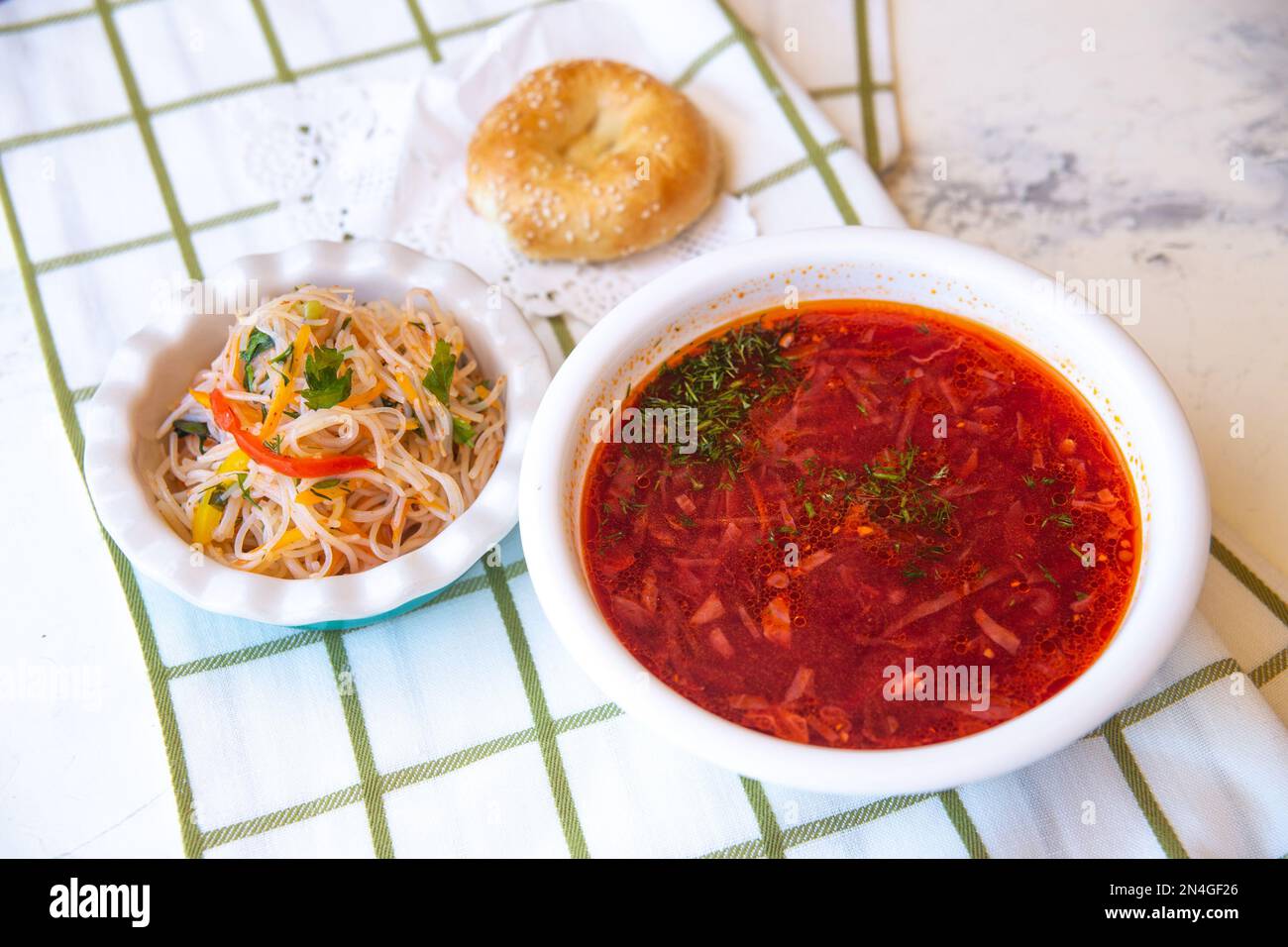 top view of borscht, salad and bread cake on the table Stock Photo