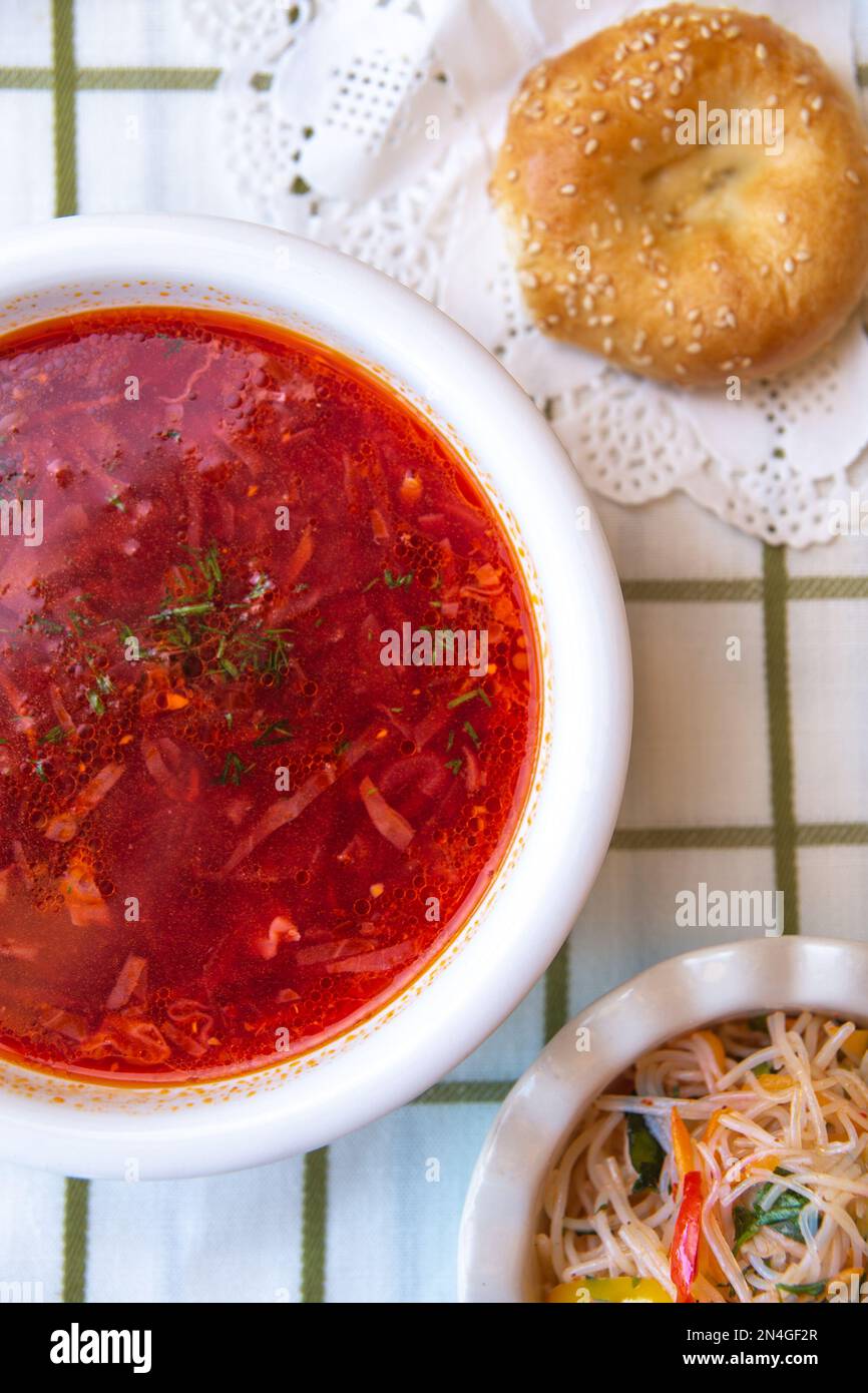 top view of borscht, salad and bread cake on the table Stock Photo
