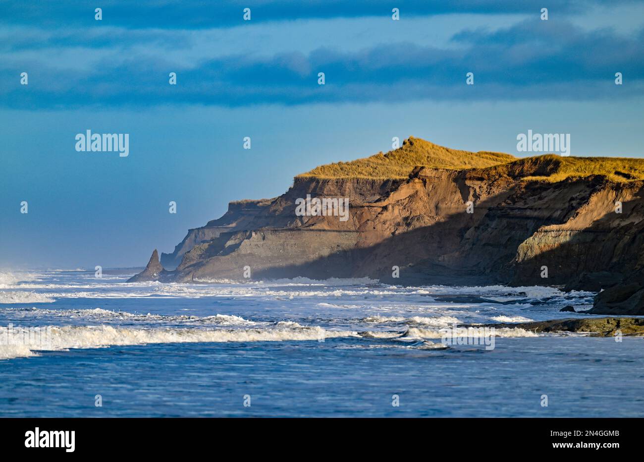 Agger, Denmark. 02nd Feb, 2023. In the light of the morning sun waves of the North Sea break on the west coast at the National Park Thy. The national park stretches from Agger Tange in the south to Hanstholm in the north. Credit: Patrick Pleul/dpa/Alamy Live News Stock Photo