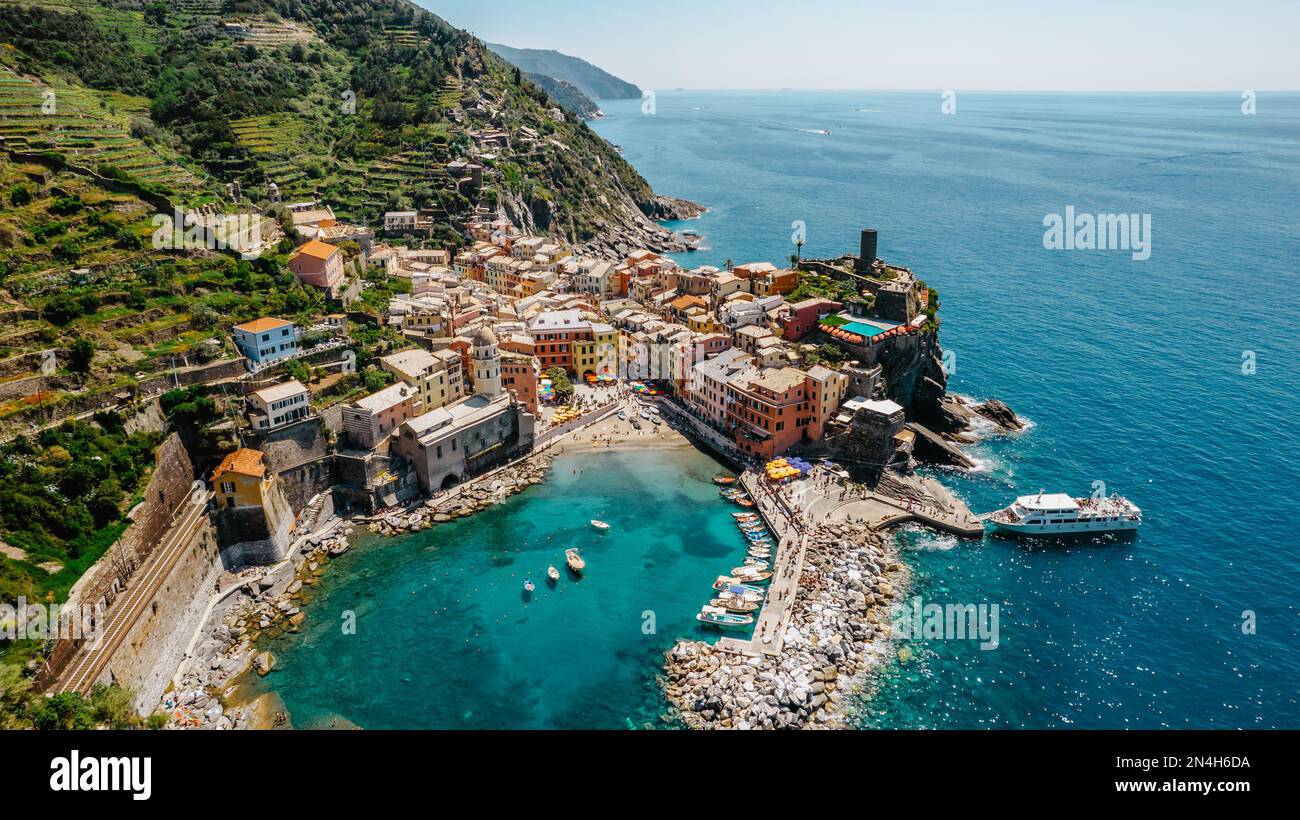 Aerial view of Vernazza and coastline of Cinque Terre,Italy.UNESCO Heritage Site.Picturesque colorful village by Mediterranean sea.Summer holiday,trav Stock Photo