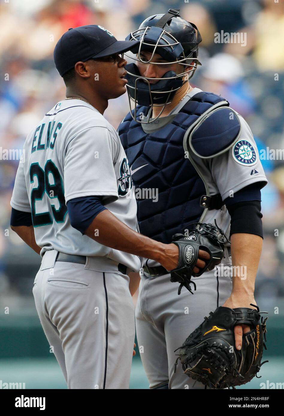 Seattle Mariners pitcher Roenis Elias (29) and catcher Mike Zunino (3