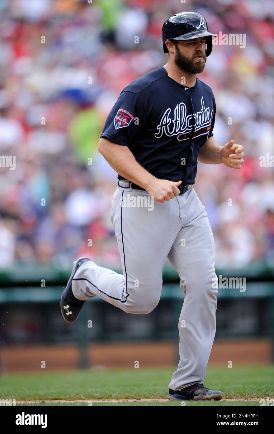 Atlanta Braves' Evan Gattis goes to first as he walked during the sixth  inning of a baseball game against the Washington Nationals, Sunday, June  22, 2014, in Washington. The Nationals won 4-1. (