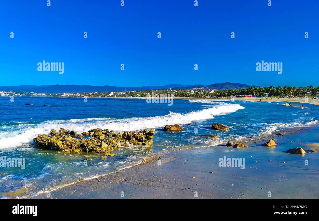 Beautiful rocks cliffs stones boulders and huge big powerful surfer ...