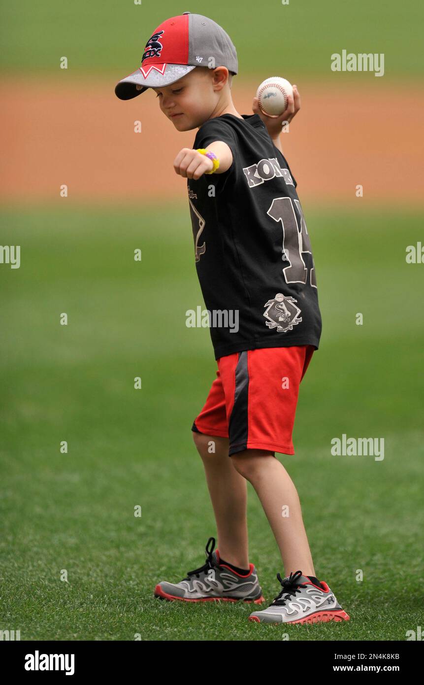Owen Konerko 5, son of Chicago White Sox player Paul Konerko, throws
