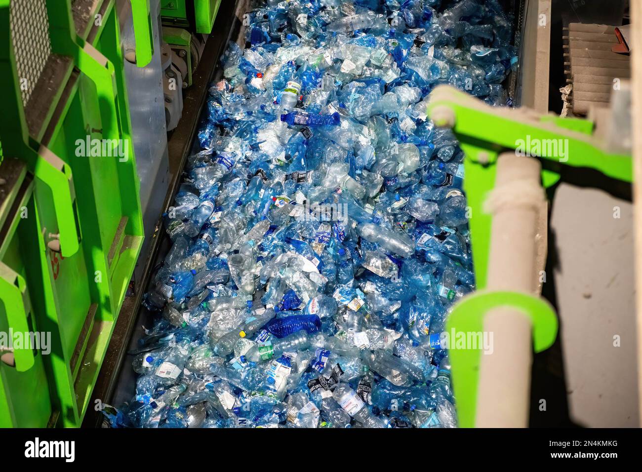 Blue PET plastic bottles are seen sorted at the modernized waste