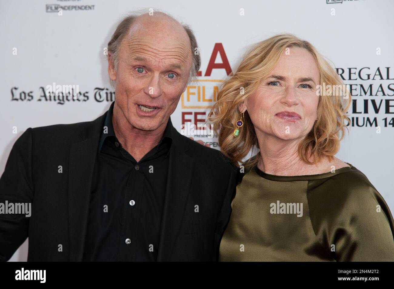 Ed Harris, left, and Amy Madigan arrive at the Los Angeles Film