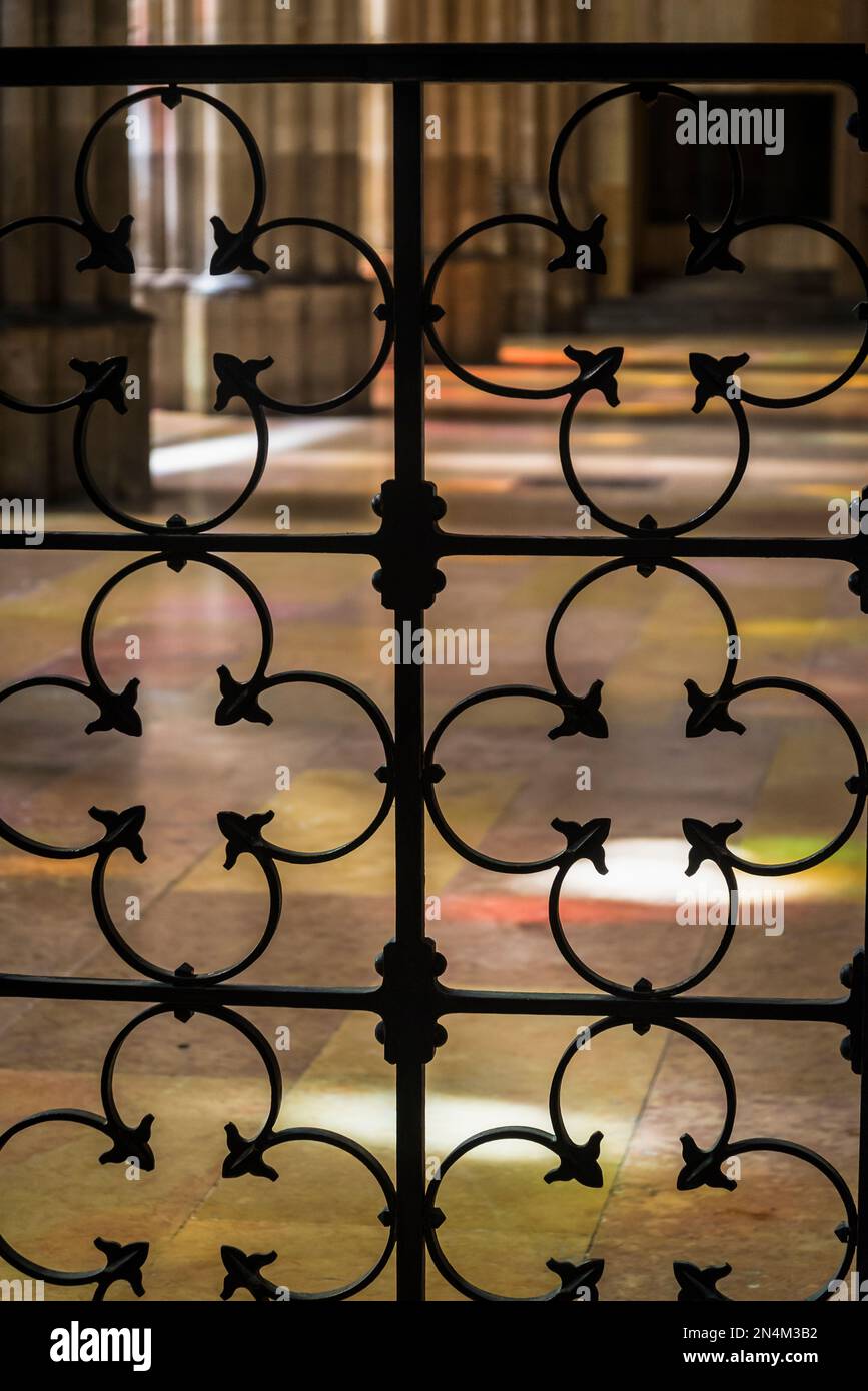 Coloured light from stained glass windows on the floor of the Basilica