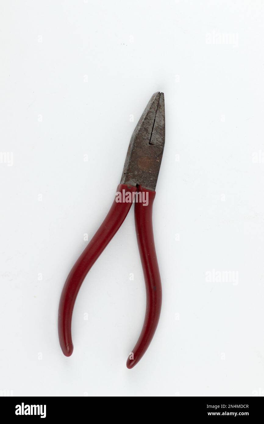 A pair of pliers isolated on white Stock Photo Alamy