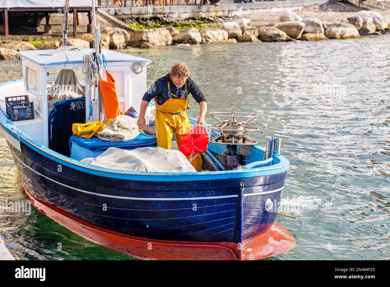 Sorrento, Italy - Local fisherman on his fishing boat returning from ...