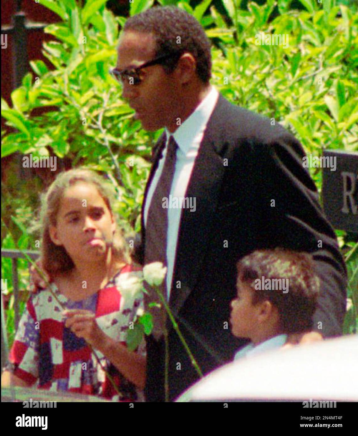 nicole brown simpson funeral dress In this June 16, 1994 file photo, O.J. Simpson, center, daughter Sydney and son Justin arrive at a private for his ex-wife in the Brentwood section of Los Shoulder:One Shoulder