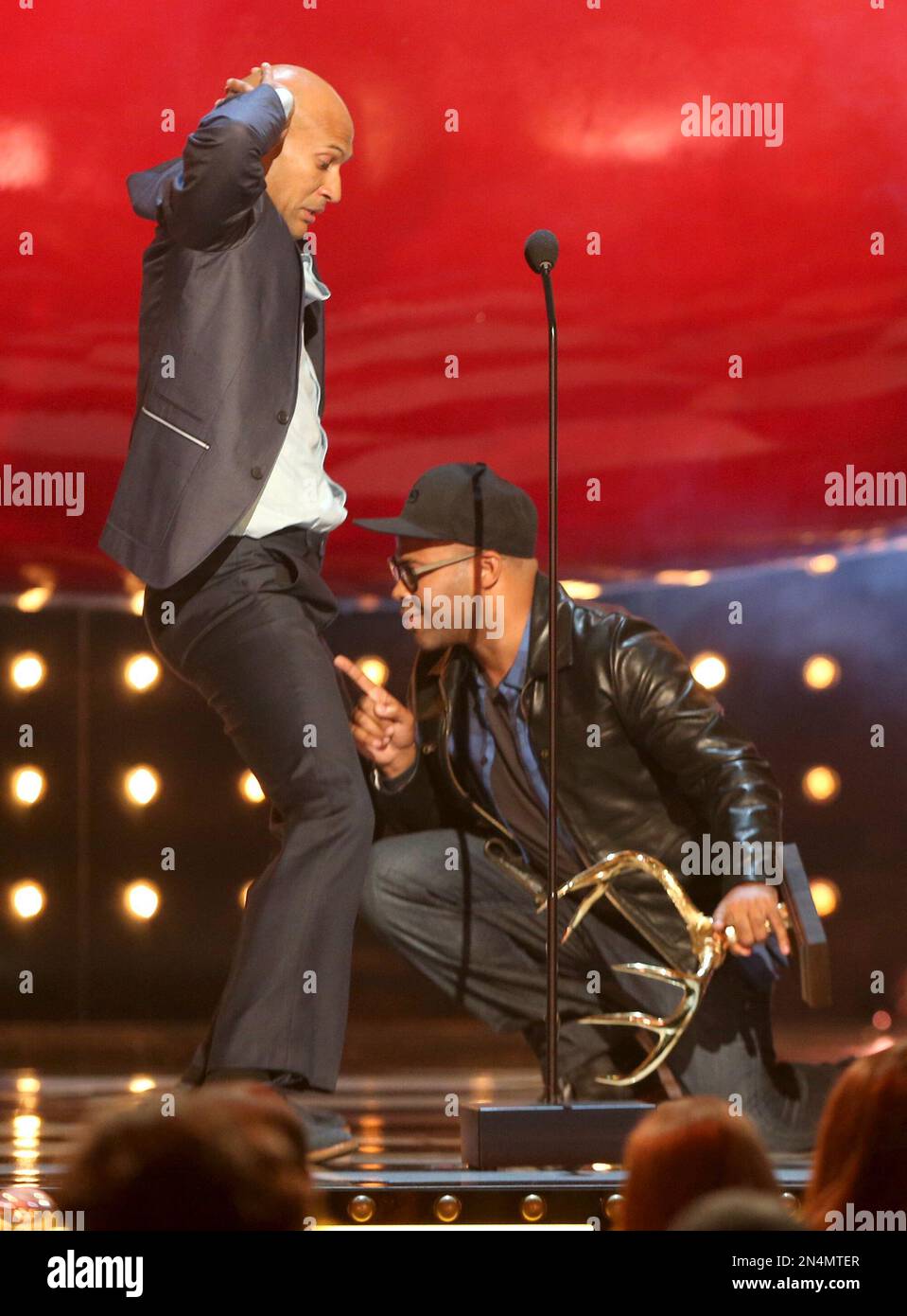 Key and Peele accept the hottest couple award onstage at the Guys