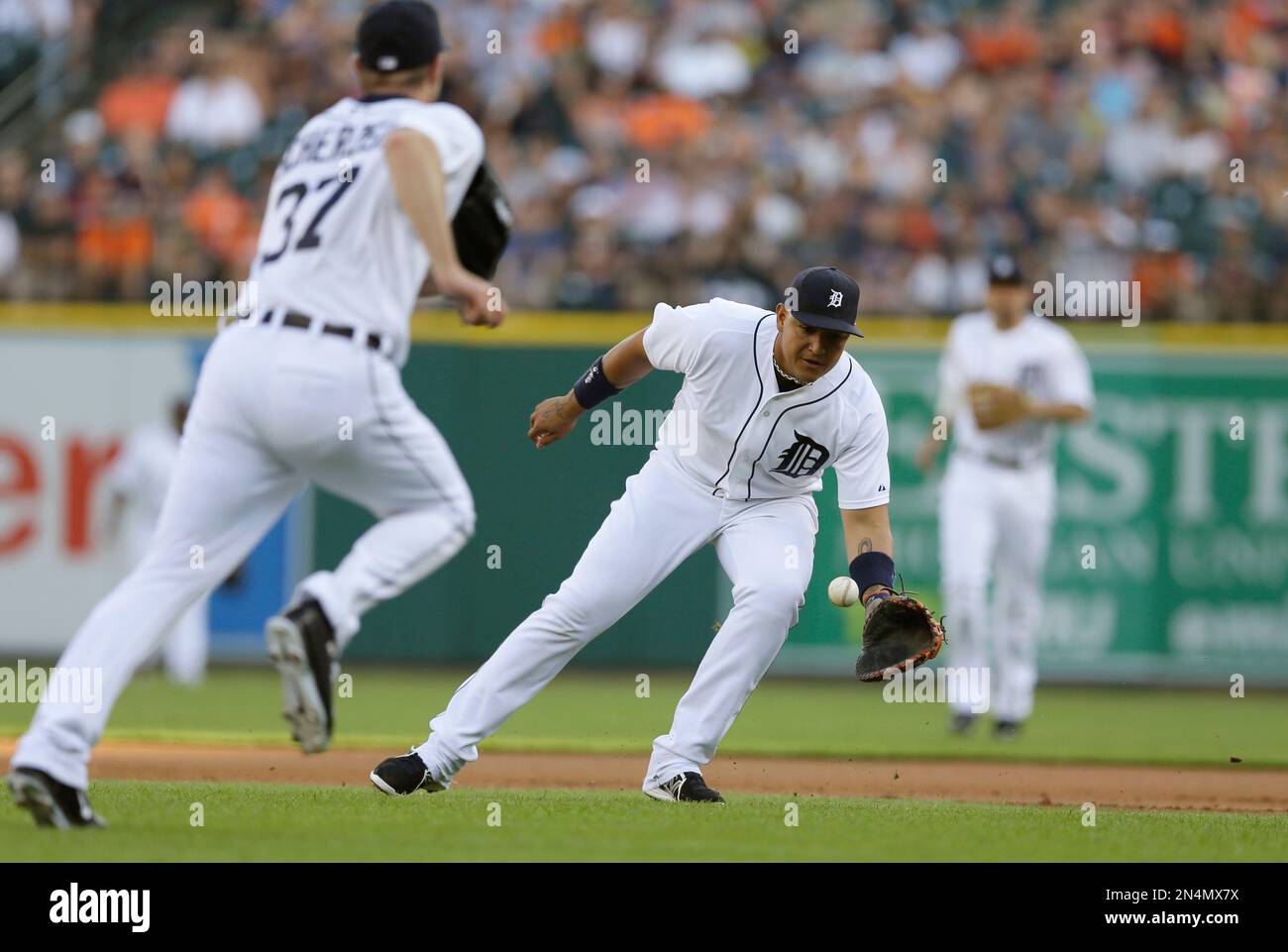 Detroit Tigers first baseman Miguel Cabrera picks up a grounder hit by