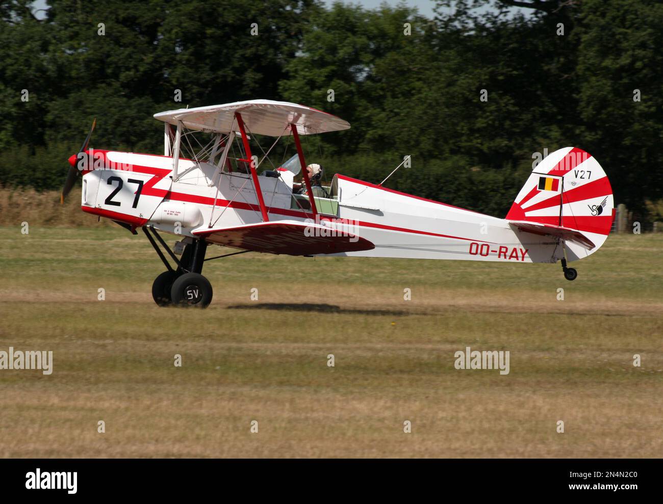 A Stampe and Vertongen SV-4 Belgian made biplane in action at Headcorn airfield Kent England Stock Photo