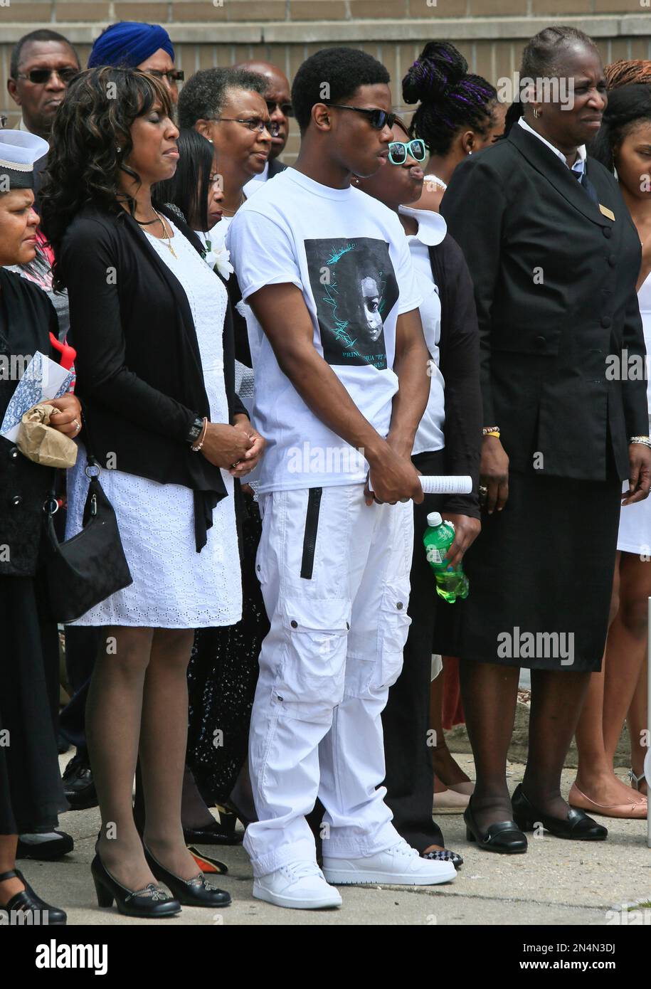 relatives-and-friends-gather-at-the-funeral-for-prince-joshua-avitto