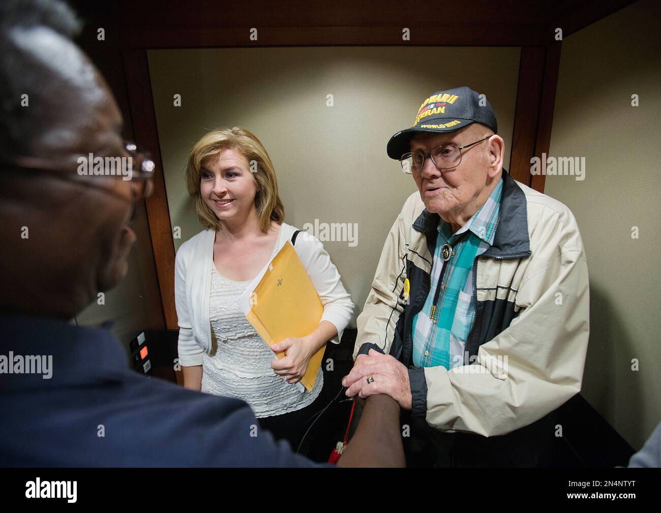 Ninety-four-year-old World War II veteran Sherwin Callander, right, is ...