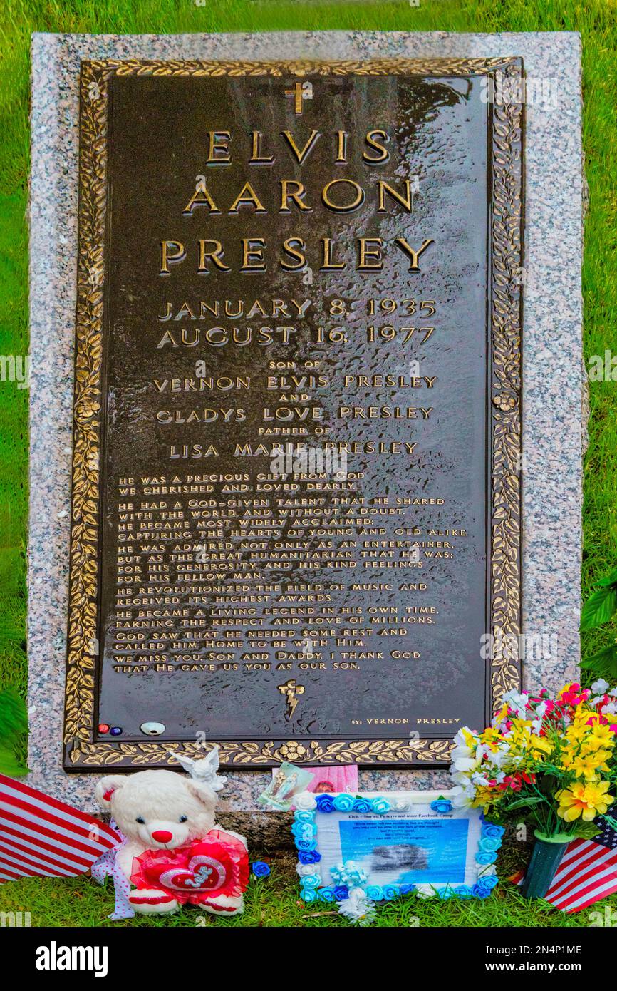 The bronze marker on Elvis Presley’s Grave in the Meditation Garden at Graceland, his home in Memphis, Tennessee. Stock Photo