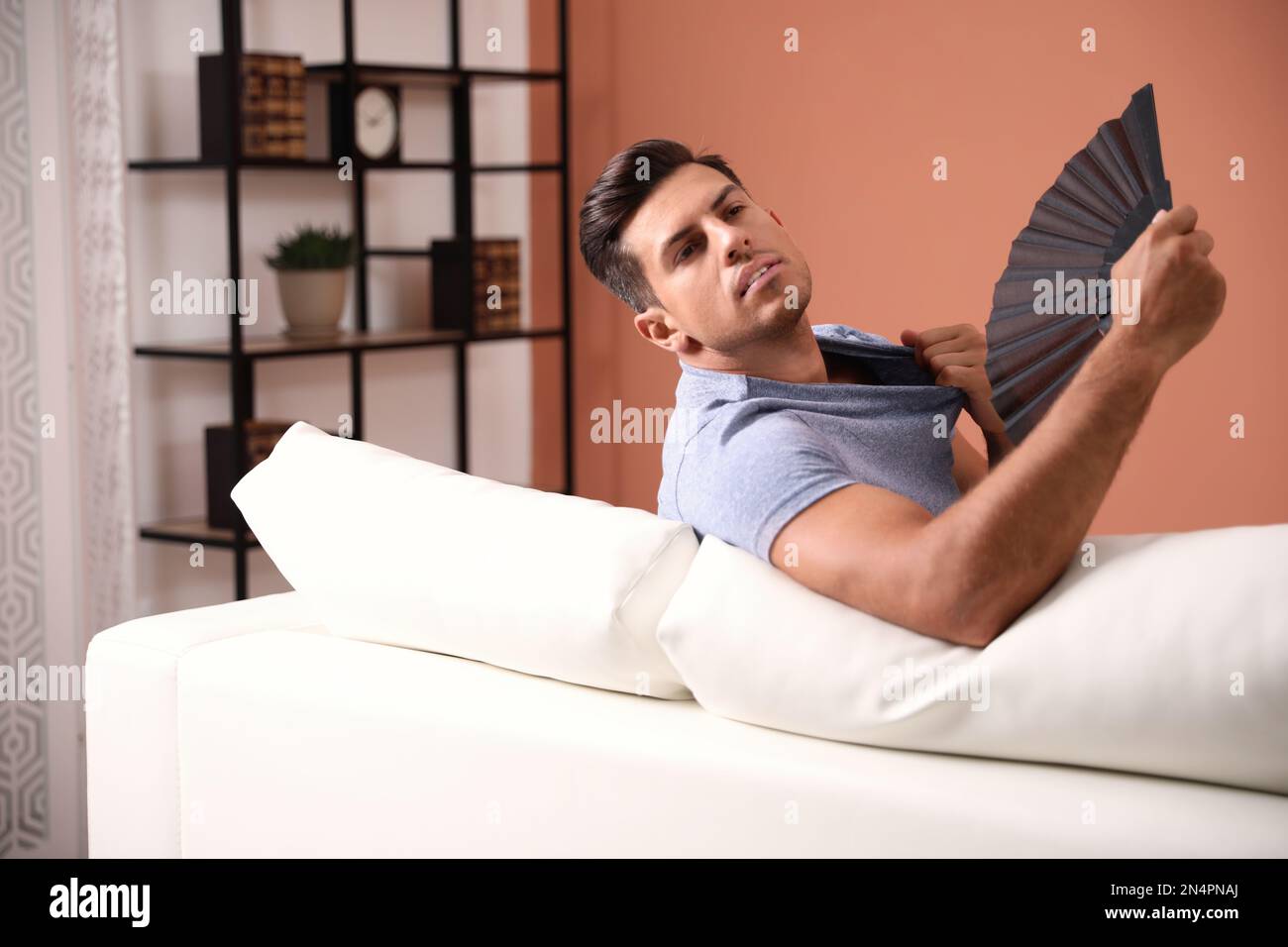 Man sitting on cooler hi-res stock photography and images - Alamy