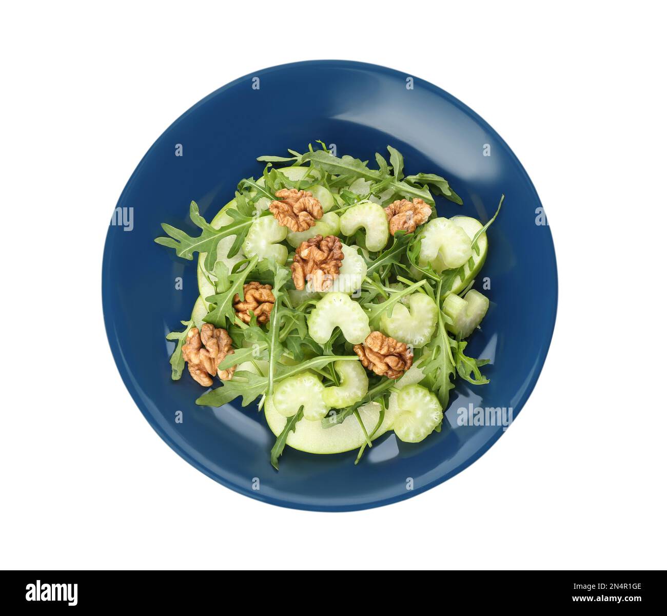 Delicious fresh celery salad isolated on white, top view Stock Photo