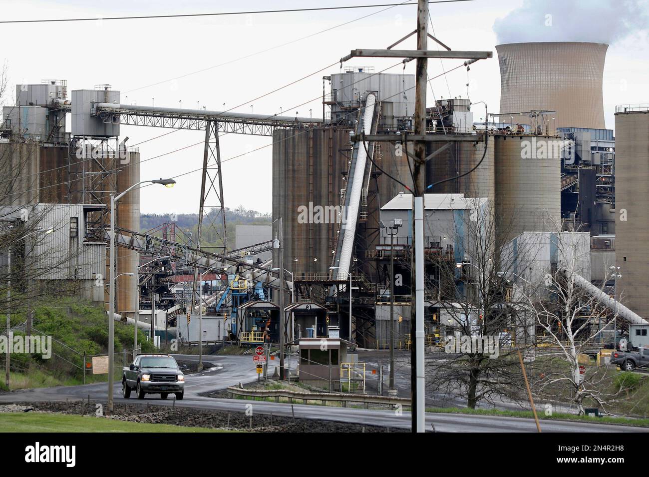 This photo taken May 5, 2014 shows a pickup truck driving down a road