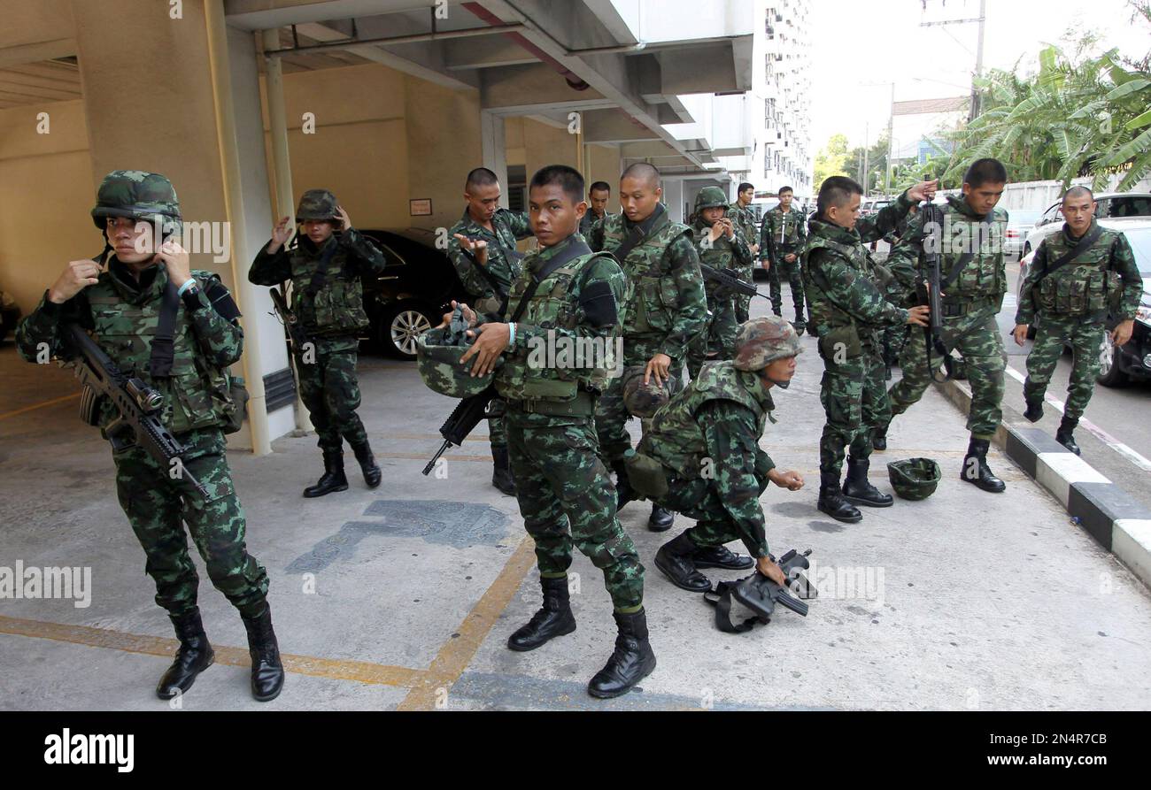 Thai soldiers guard at the office of the Attorney General as anti