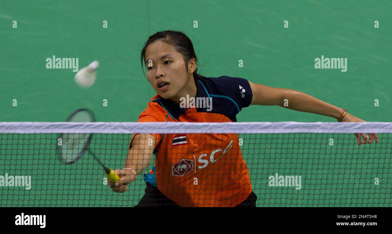 Thailands Ratchanok Intanon returns a shot to Indias Saina Nehwal during their womens singles match of the Uber Cup Badminton in New Delhi, India, Tuesday, May 20, 2014