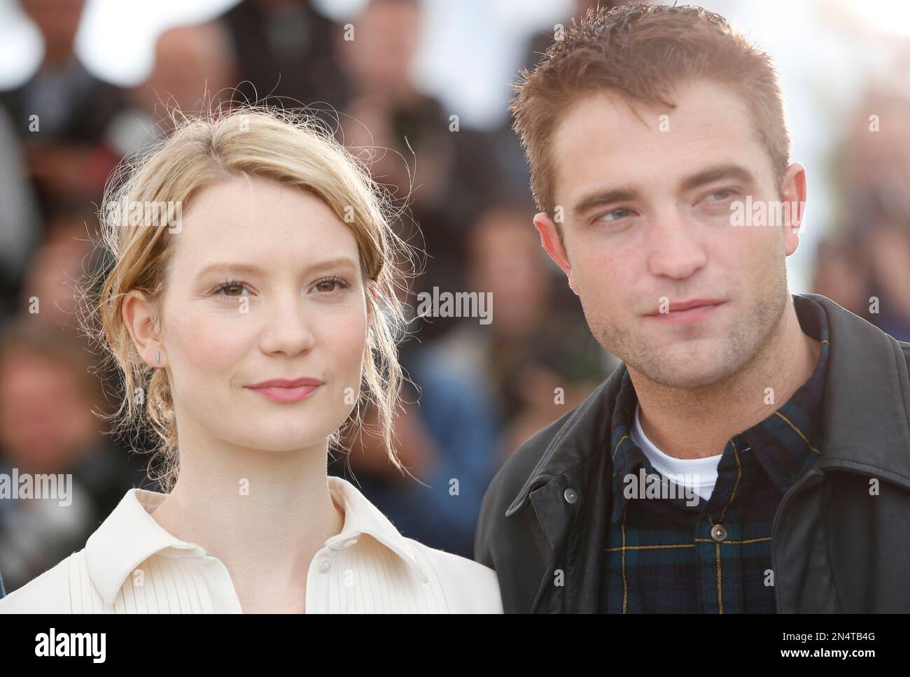 Actors Mia Wasikowska and Robert Pattinson during a photo call for 