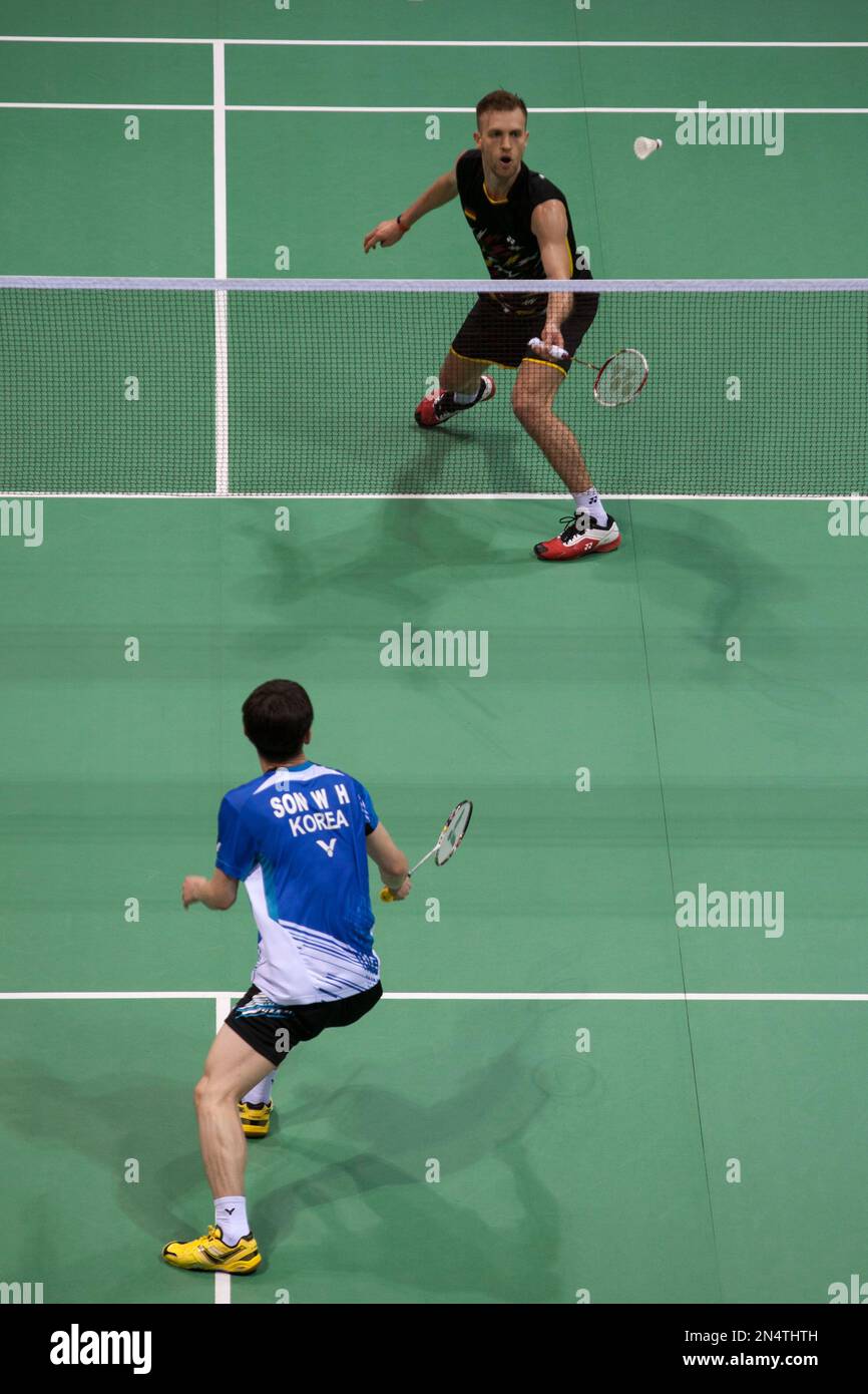 Germanys Marc Zwiebler, top,reaches to return a shot against South Koreas Son Wan-Ho during their mens singles event of the Thomas Cup Badminton in New Delhi, India, Sunday, May 18, 2014