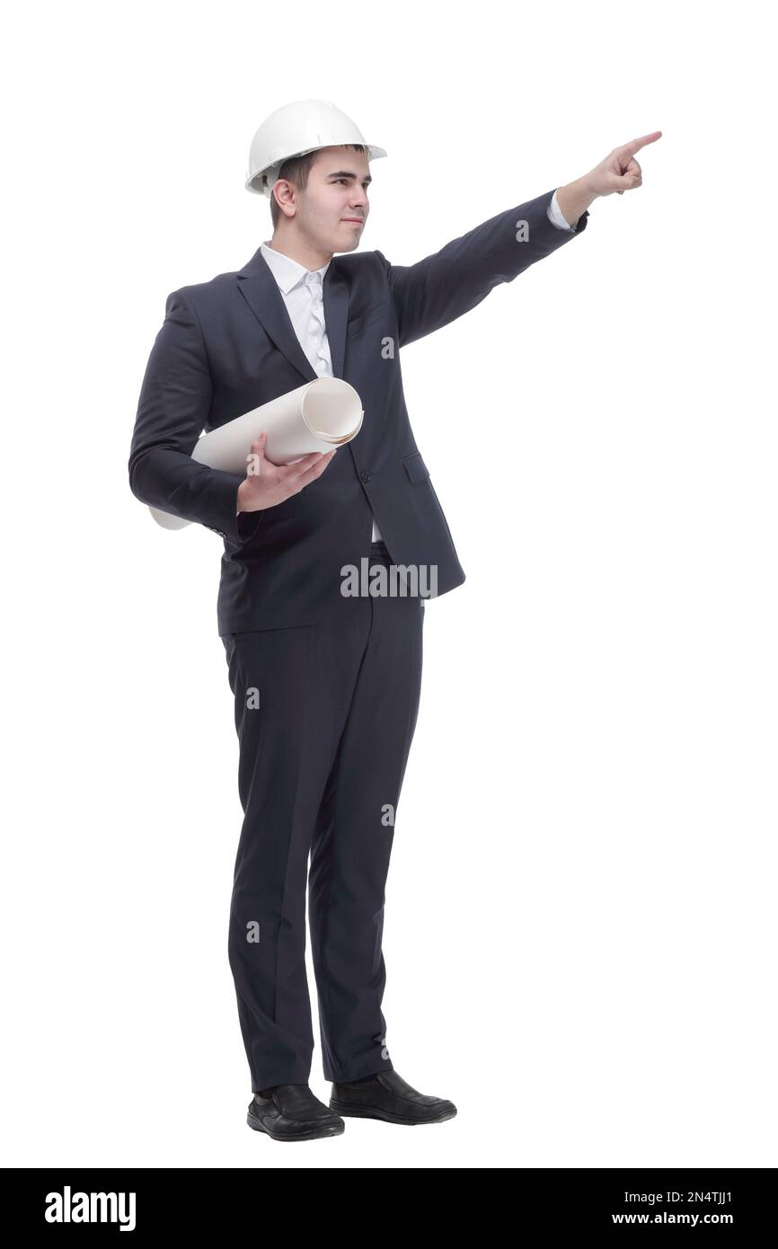 Front view of young architect man in hardhat holding blueprints walking