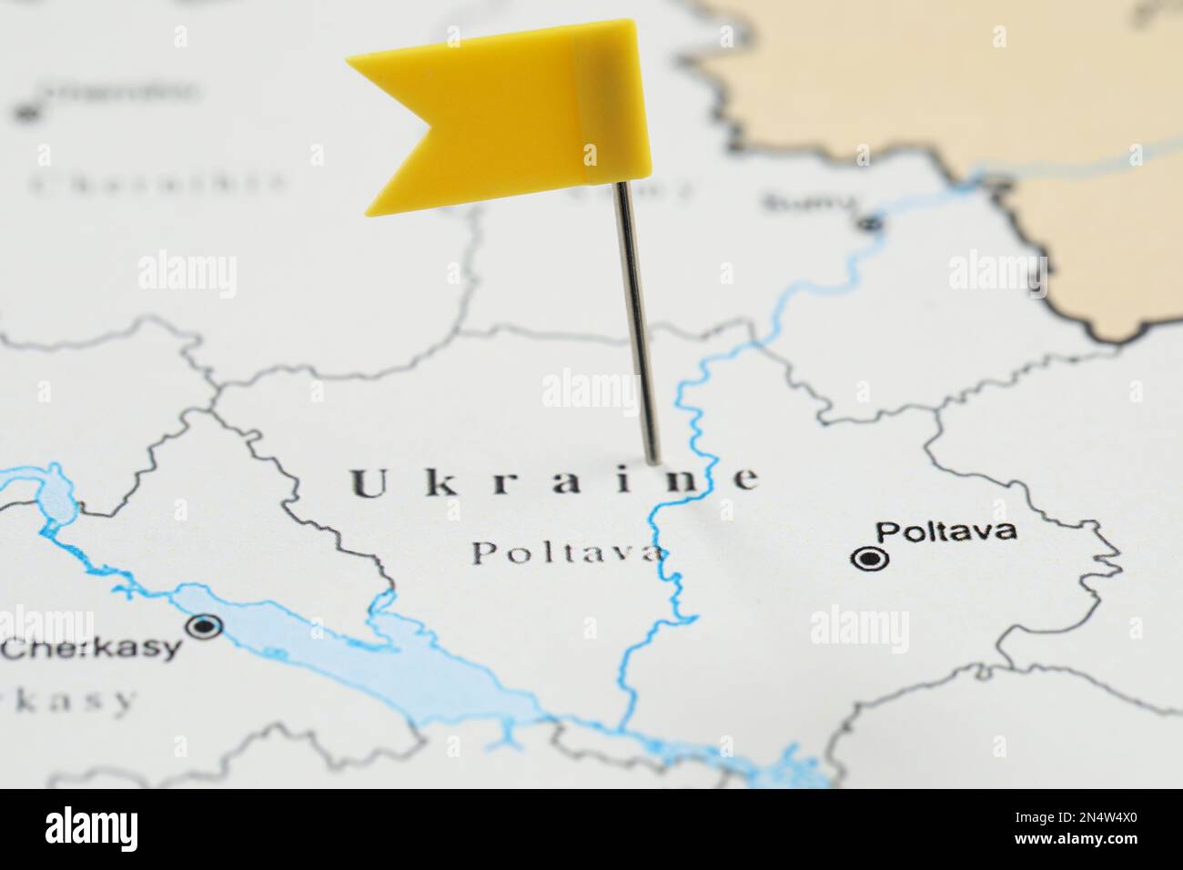 MYKOLAIV, UKRAINE - NOVEMBER 09, 2020: Contour map of Ukraine with flag push pin, closeup Stock Photo