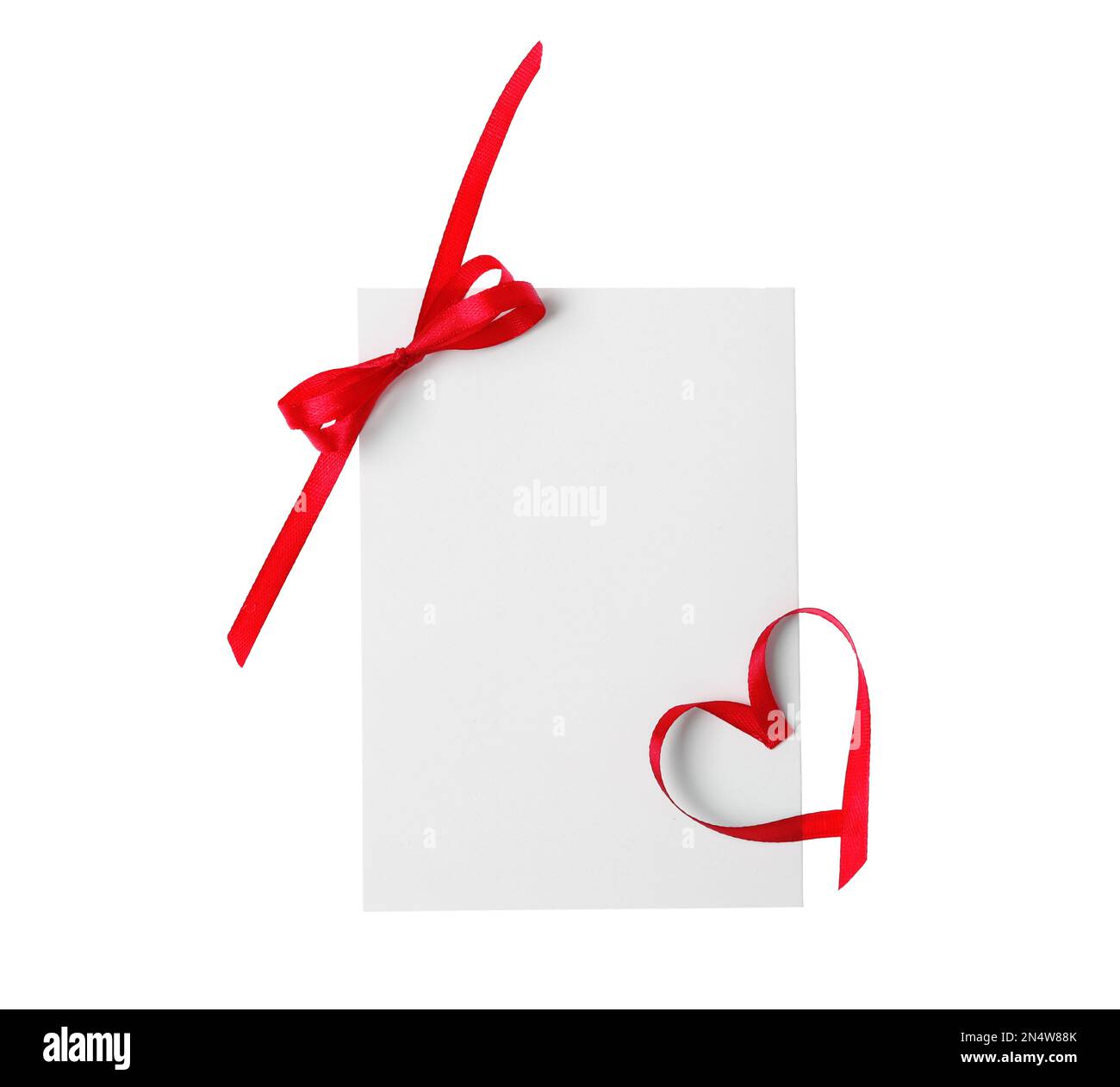 Blank card with bow and heart made of red ribbon on white background ...