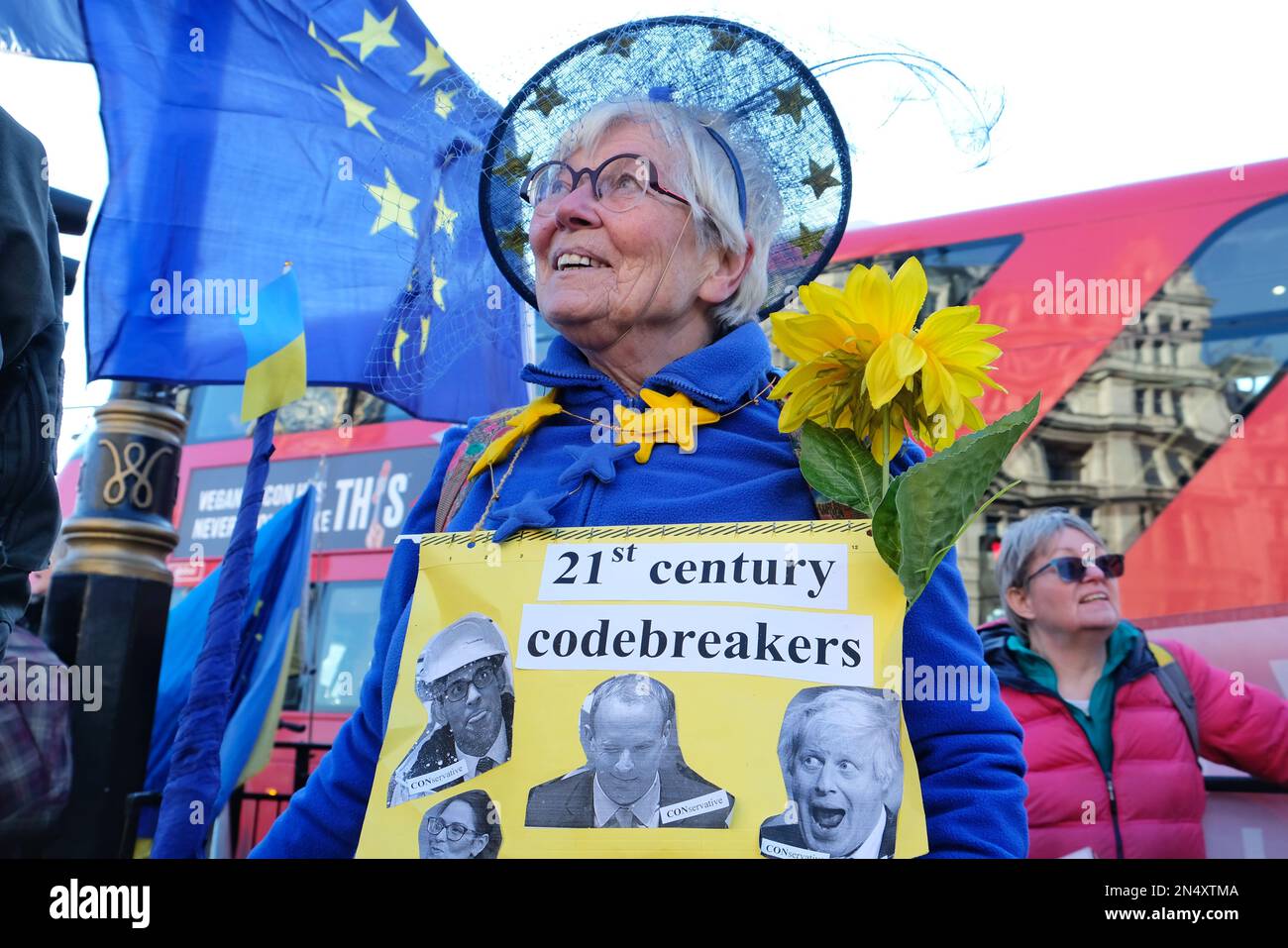 London,UK. A pro-EU protester holds an anti-Tory placard mocking several members of the Cabinet, as the party is rocked by multiple scandals. Stock Photo