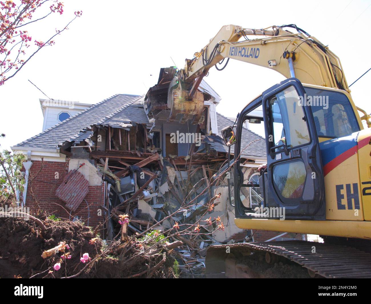 A construction crew demolishes the Mantoloking N.J. municipal building