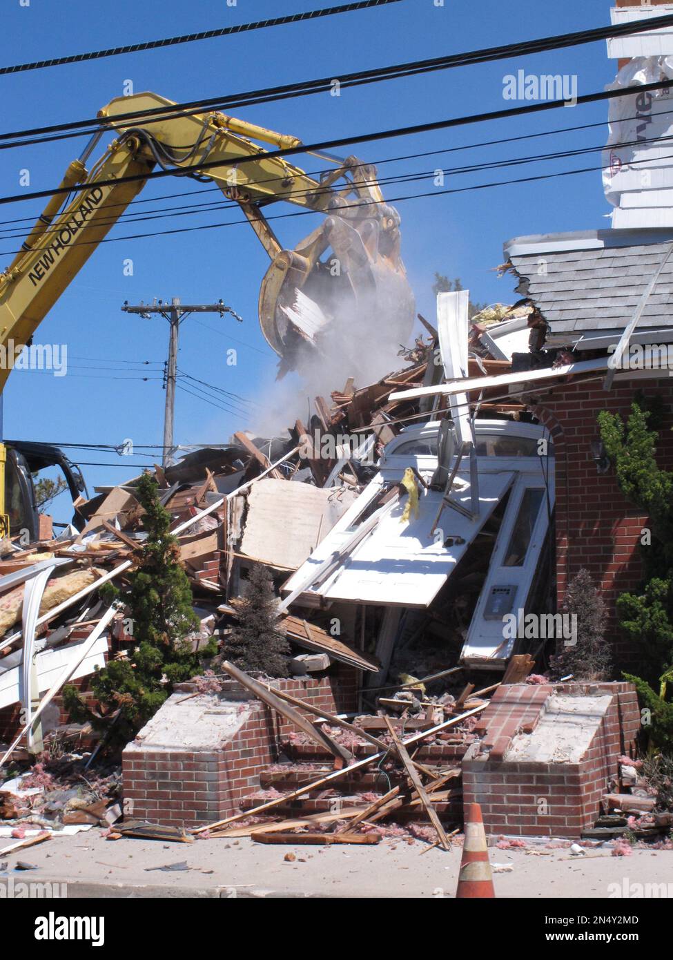 A construction crew demolishes the Mantoloking N.J. municipal building
