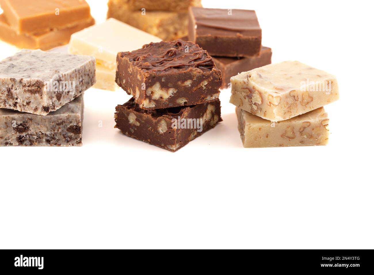 An Assortment of Various Flavors of Fudge on a White Background Stock