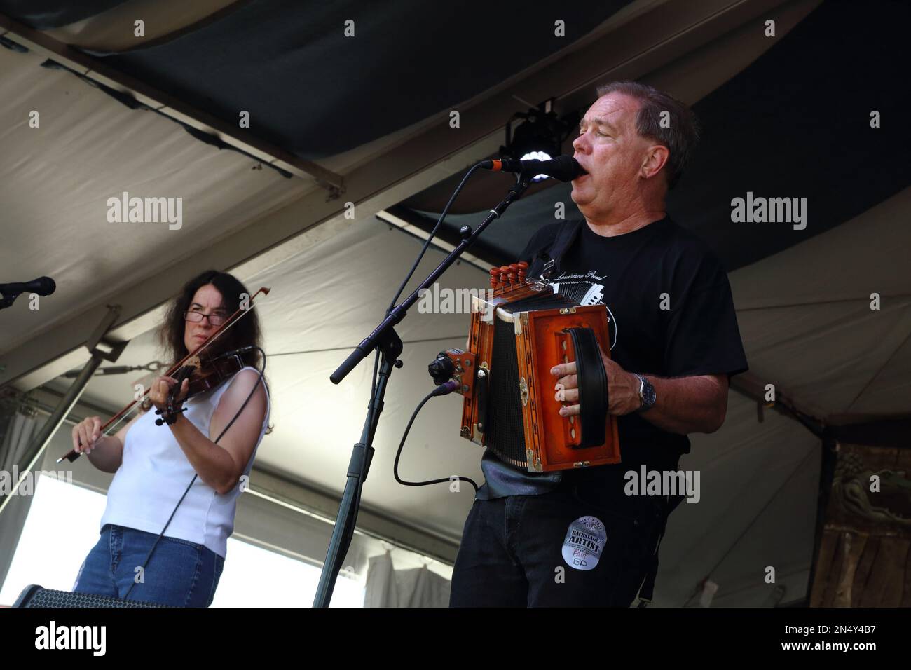 Bruce Daigrepont Cajun Band performs at the 2014 New Orleans Jazz & Heritage Festival at Fair Grounds Race Course on Sunday, May 4, 2014, in New Orleans. (Photo by John Davisson/Invision/AP) Stock Photo