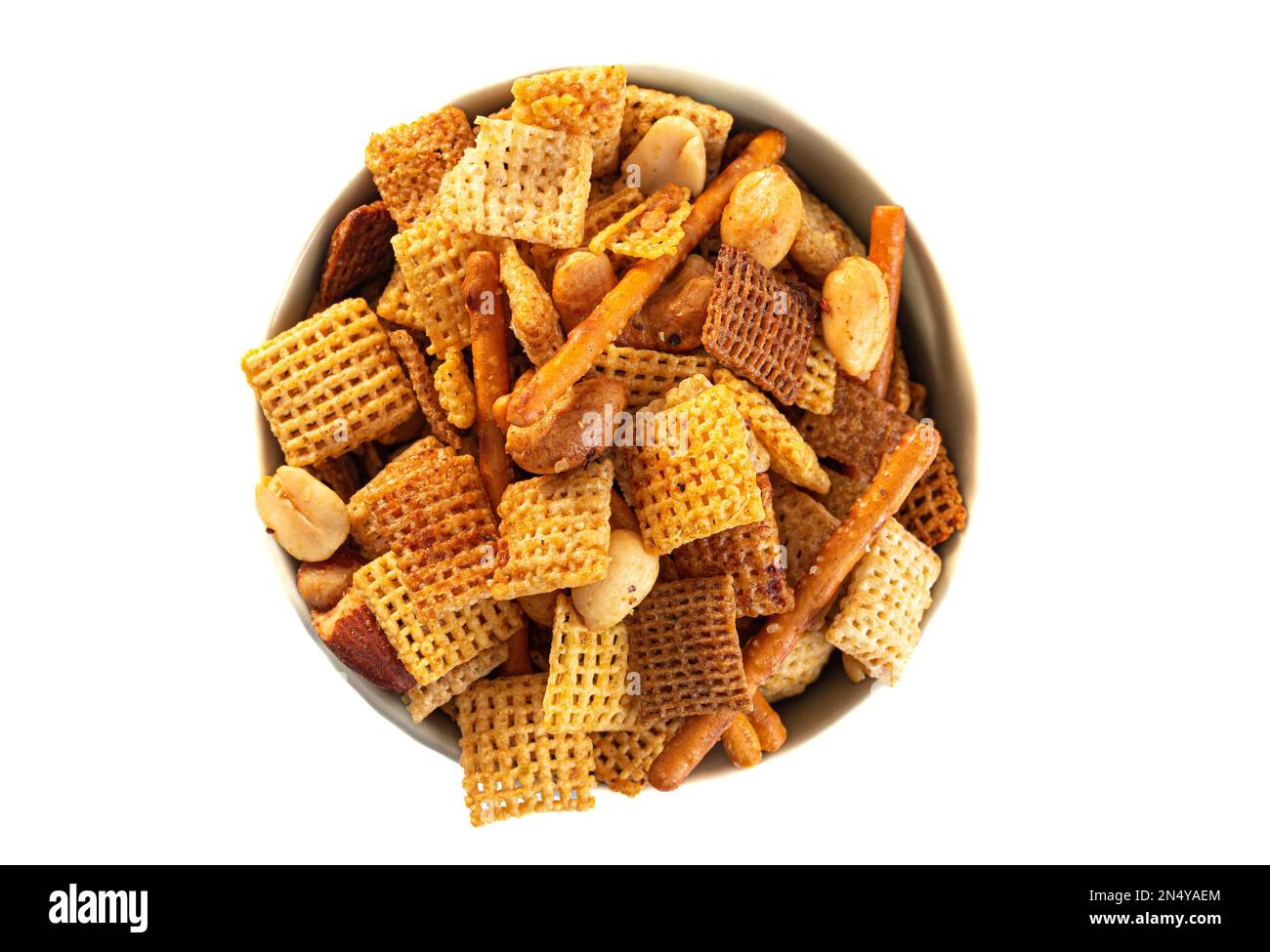 Serving of Homemade Cereal Nut and Prezel Trail Mix Isolated on a White