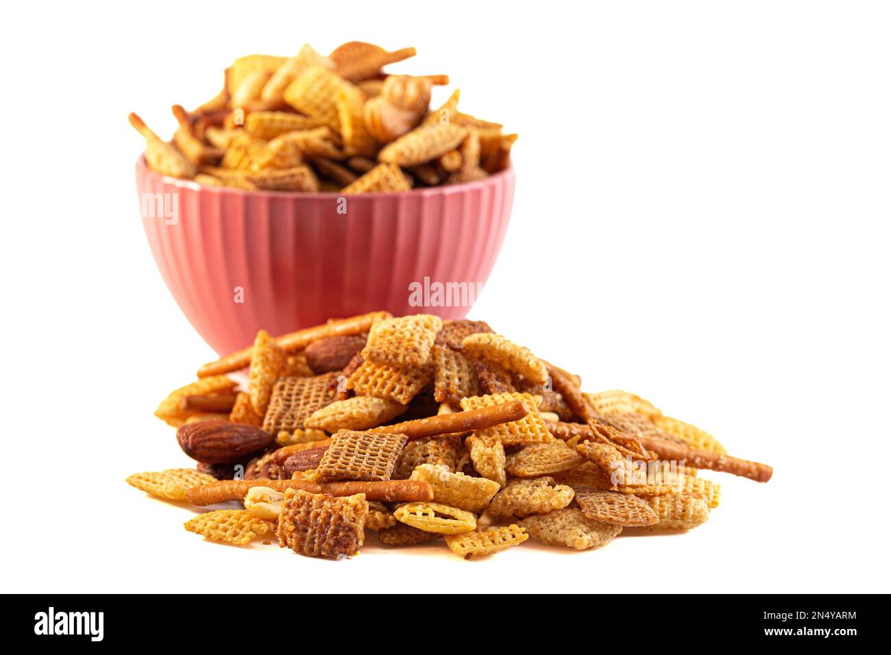Serving of Homemade Cereal Nut and Prezel Trail Mix Isolated on a White